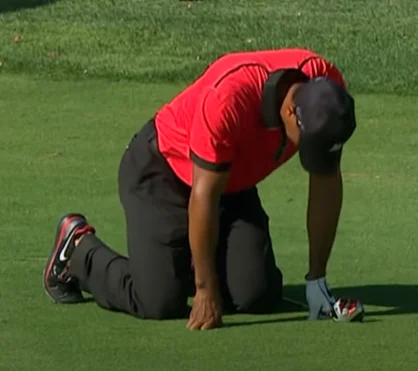 Tiger Woods experiencing back pain during competition